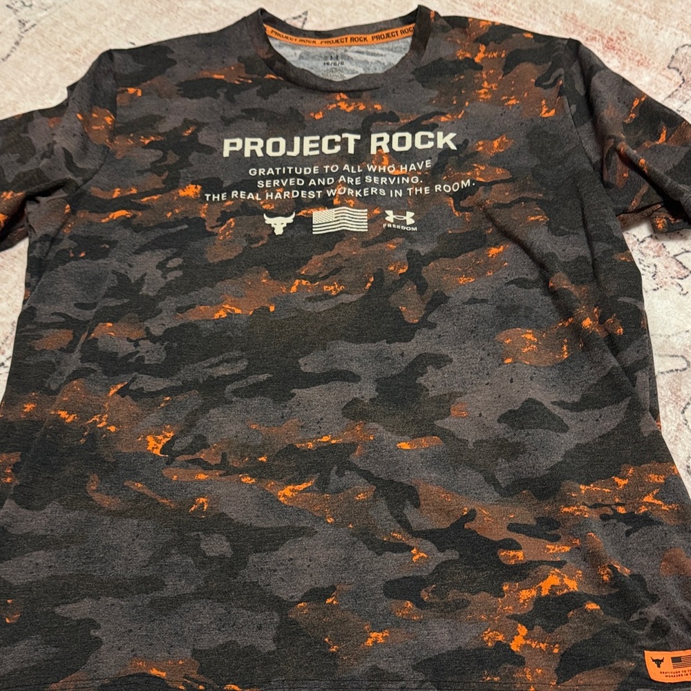 Project Rock.  Men's Camo T-Shirt - Black and Orange